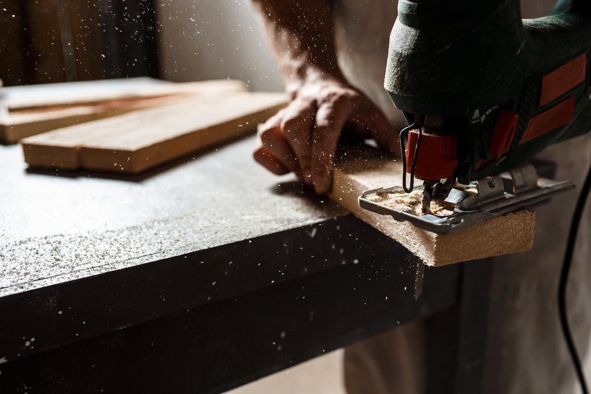 close-up-photo-cutting-wood-with-fretsaw (1)